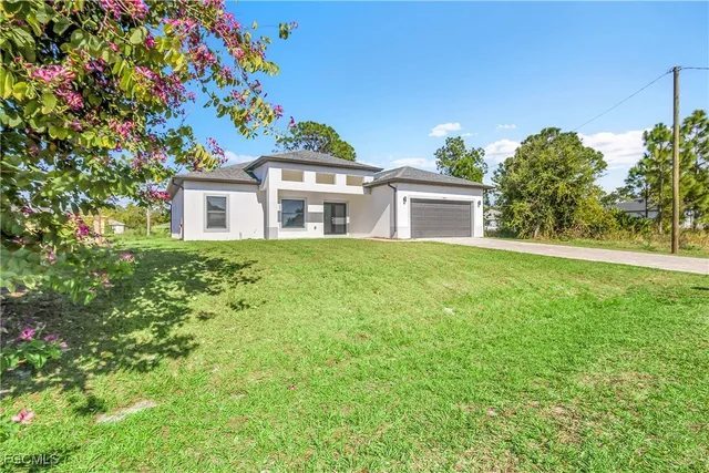 a house view with a garden space