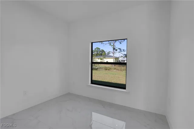 a bathroom with a sink and vanity
