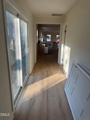 a view of a living room and a window