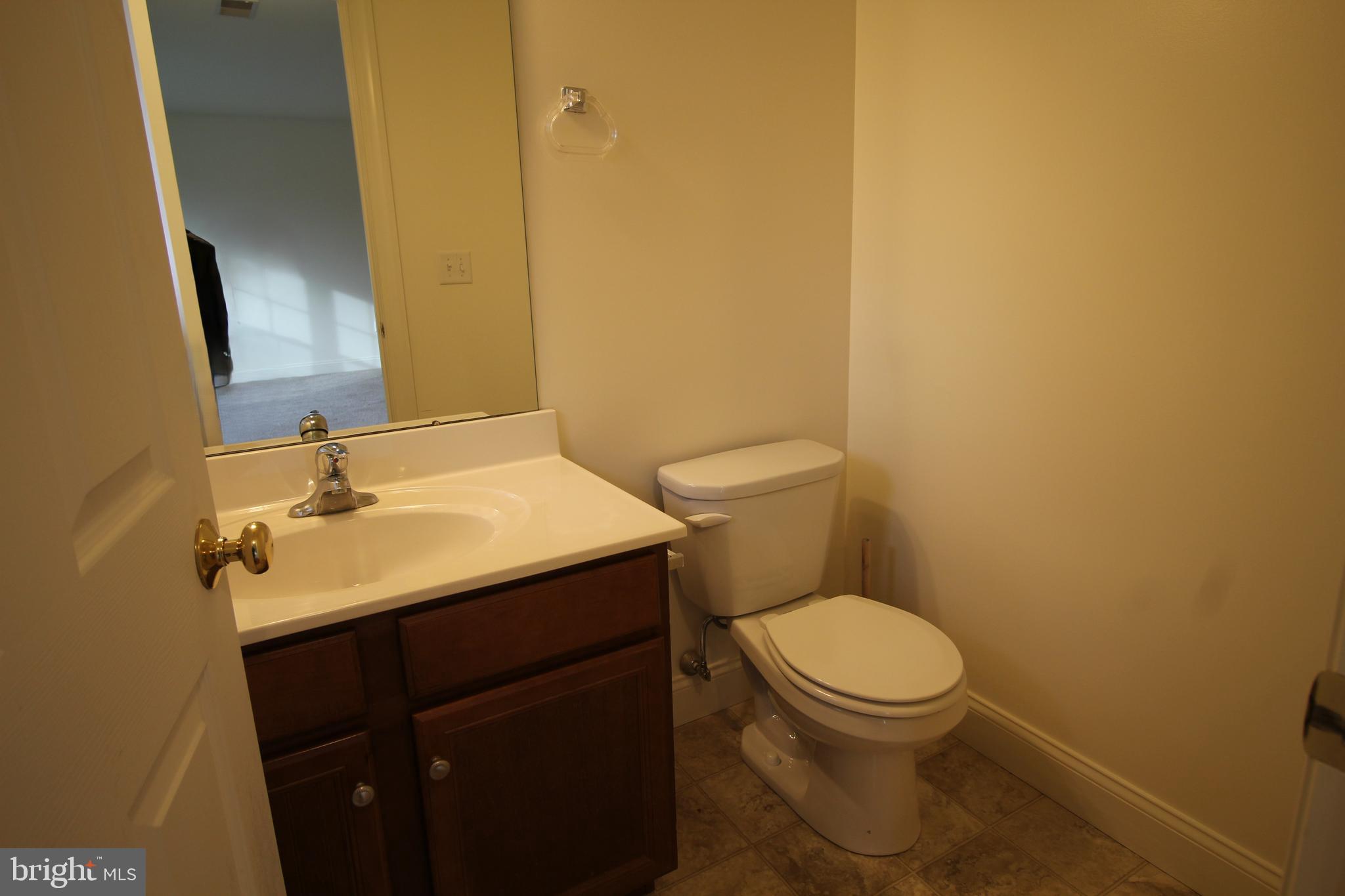 16 Bradford Drive Leola, PA 17540 - Photo 4 of 11 a bathroom with a granite countertop toilet and a sink