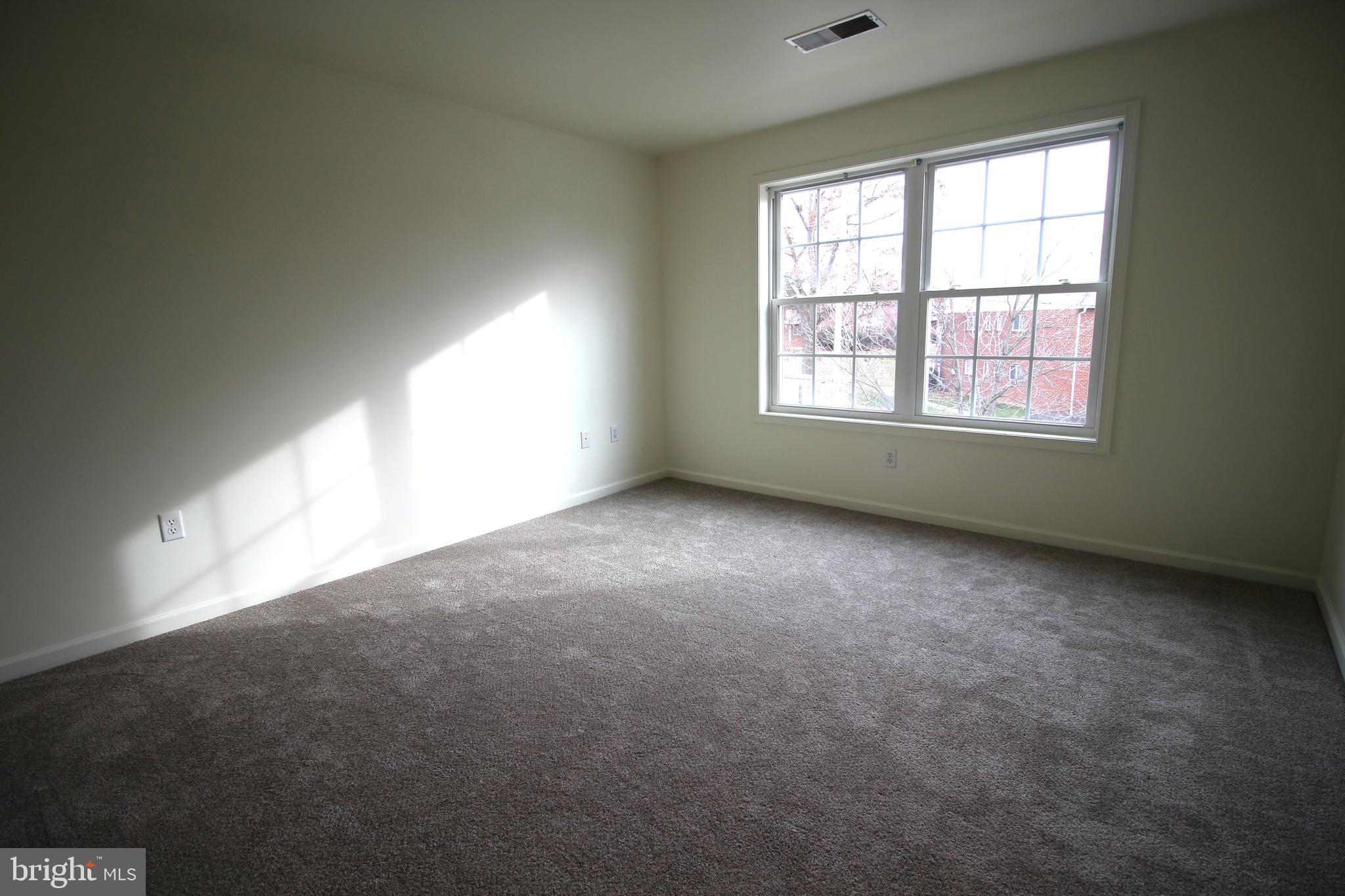16 Bradford Drive Leola, PA 17540 - Photo 5 of 11 an empty room with a window