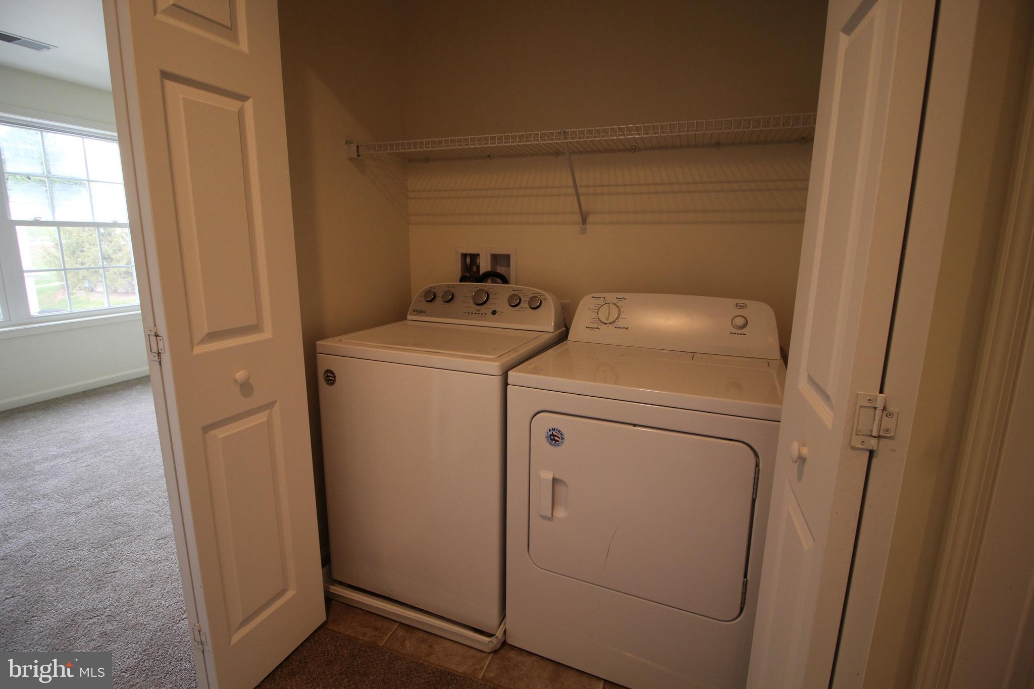 16 Bradford Drive Leola, PA 17540 - Photo 7 of 11 a utility room with dryer and washer