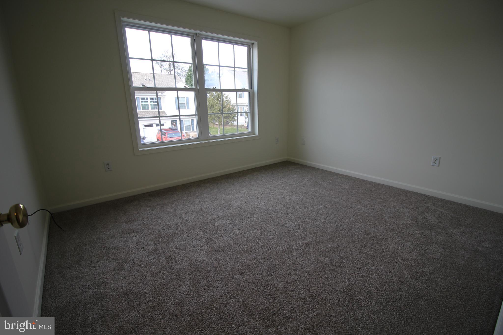 16 Bradford Drive Leola, PA 17540 - Photo 8 of 11 an empty room with a window