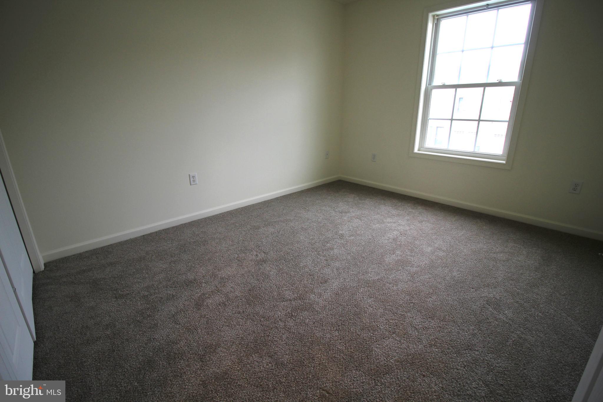 16 Bradford Drive Leola, PA 17540 - Photo 9 of 11 an empty room with a window