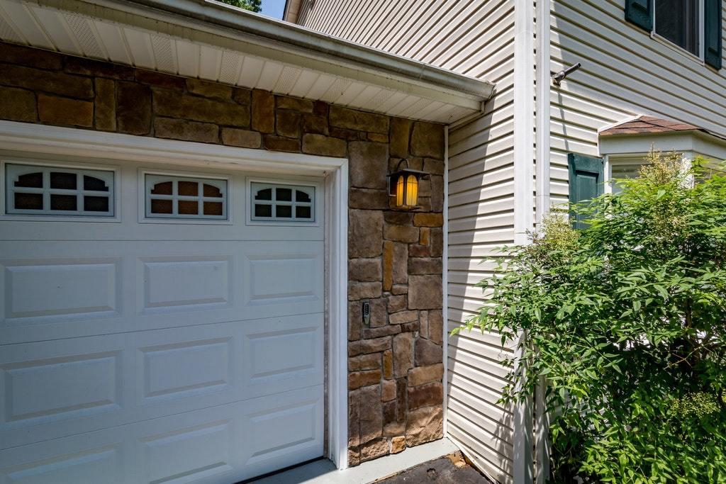 121 Oak Ridge Court Blue Ridge, VA 24064 - Photo 46 of 63 a front view of a house with a garage