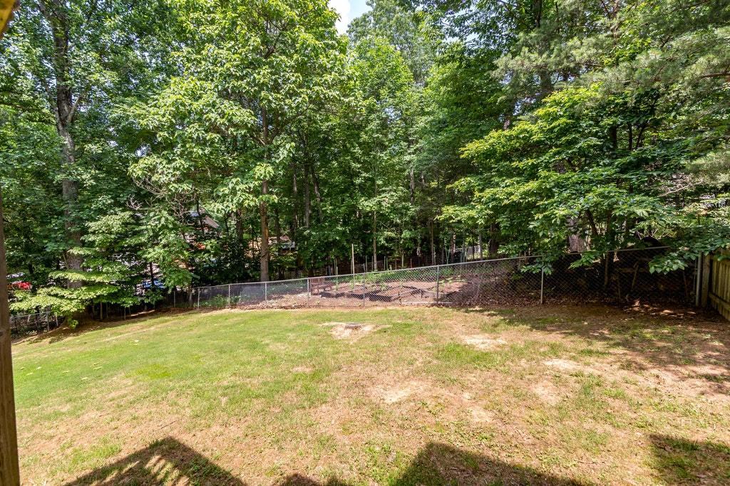 121 Oak Ridge Court Blue Ridge, VA 24064 - Photo 51 of 63 a view of a swimming pool with an outdoor seating area