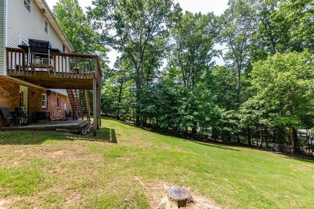 121 Oak Ridge Court Blue Ridge, VA 24064 - Photo 54 of 63 a view of a house with backyard and sitting area