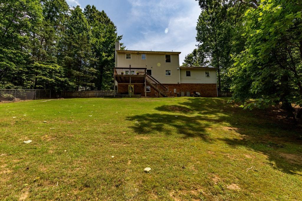 121 Oak Ridge Court Blue Ridge, VA 24064 - Photo 56 of 63 a view of a house with a yard