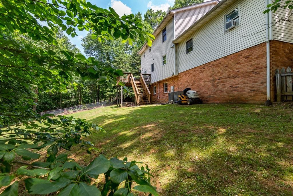 121 Oak Ridge Court Blue Ridge, VA 24064 - Photo 58 of 63 a view of a house with a yard
