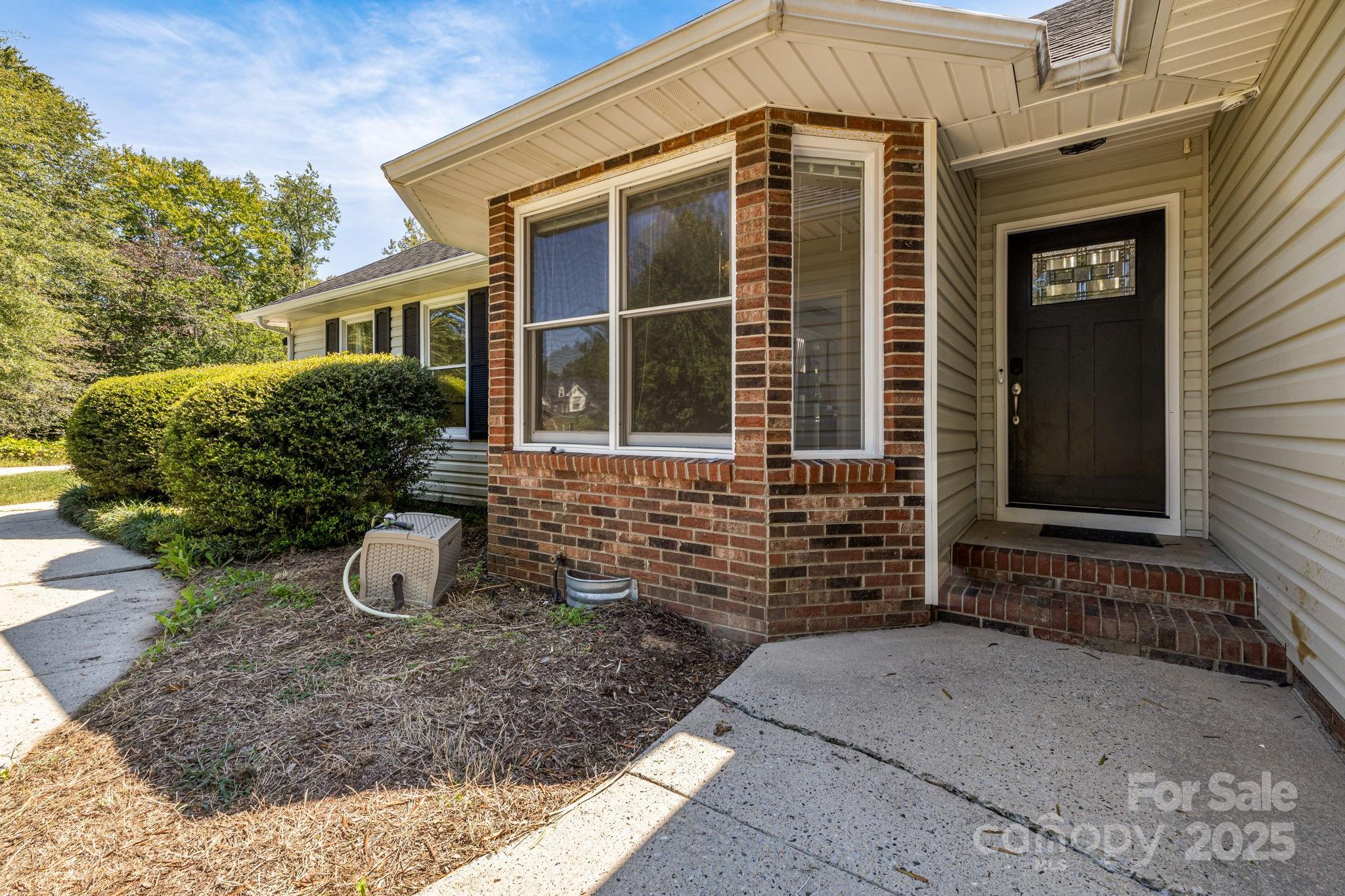 110 Ritchie Drive Shelby, NC 28152 - Photo 2 of 48 a front view of a house with garden