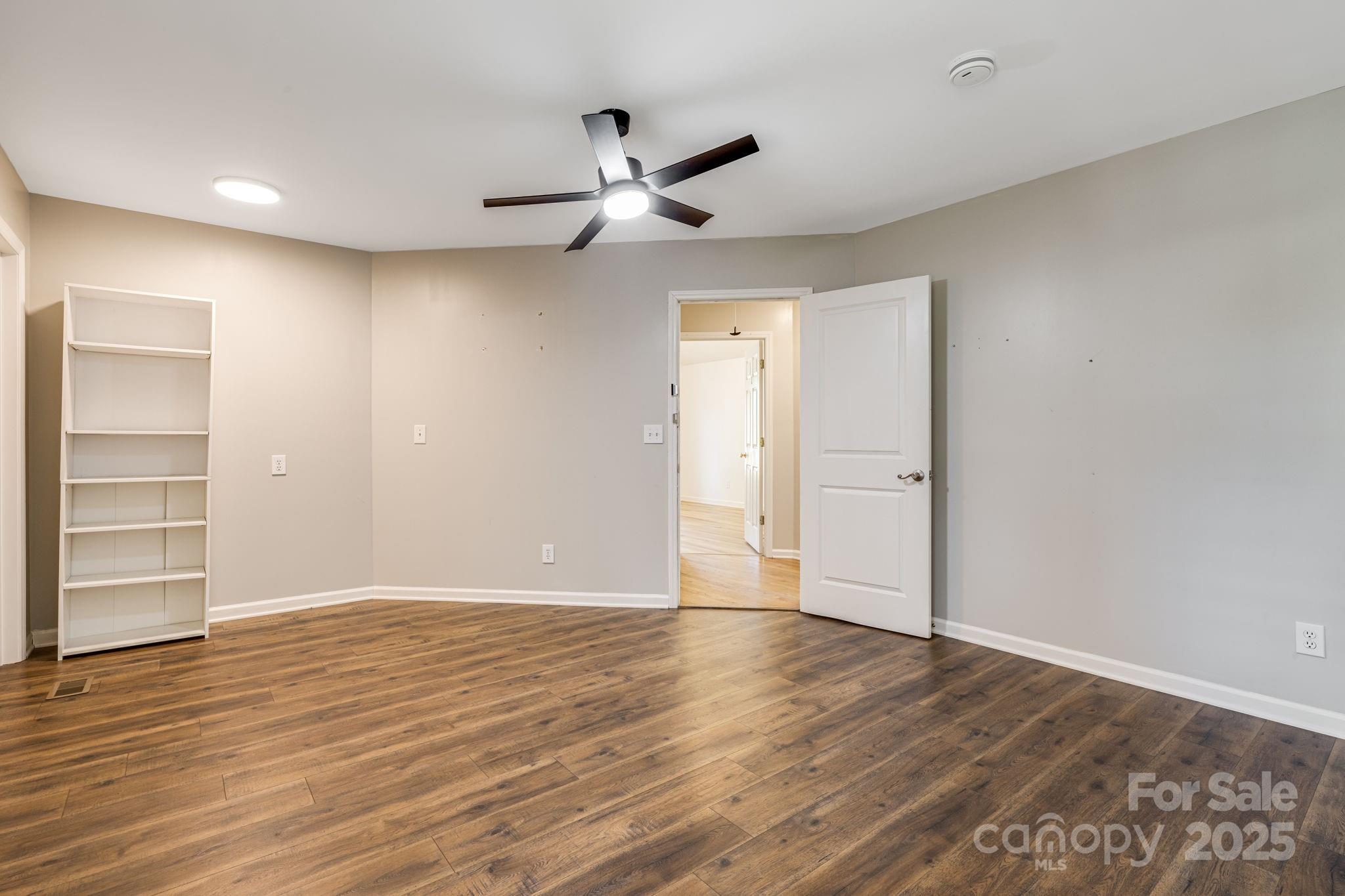 110 Ritchie Drive Shelby, NC 28152 - Photo 23 of 48 a view of an empty room with wooden floor closet and entryway