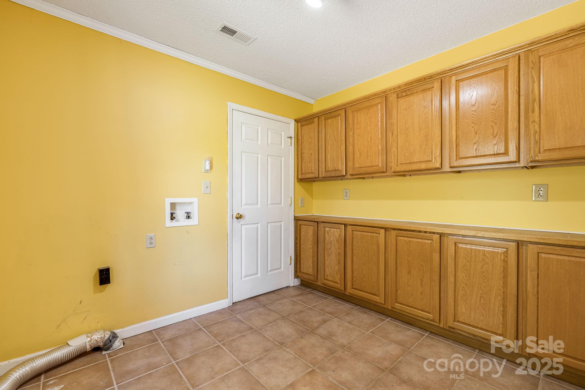 110 Ritchie Drive Shelby, NC 28152 - Photo 27 of 48 a view of a kitchen with countertop cabinets