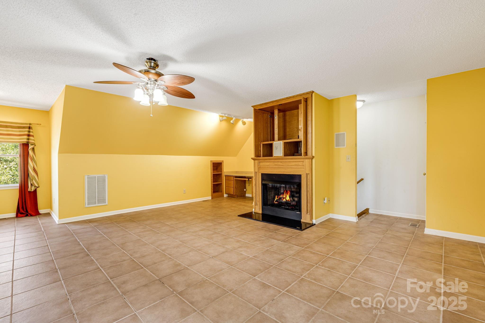 110 Ritchie Drive Shelby, NC 28152 - Photo 30 of 48 a view of an empty room with a fireplace