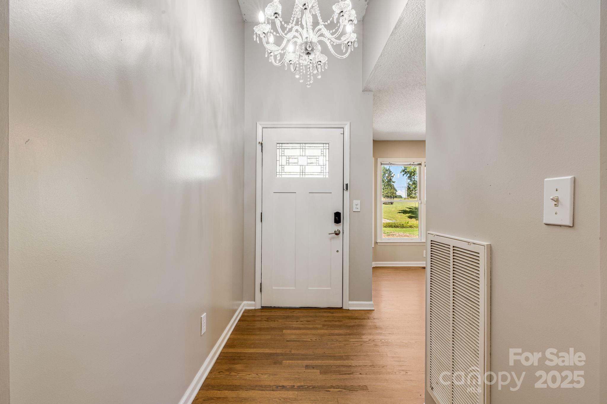 110 Ritchie Drive Shelby, NC 28152 - Photo 3 of 48 a view of an entryway with wooden floor