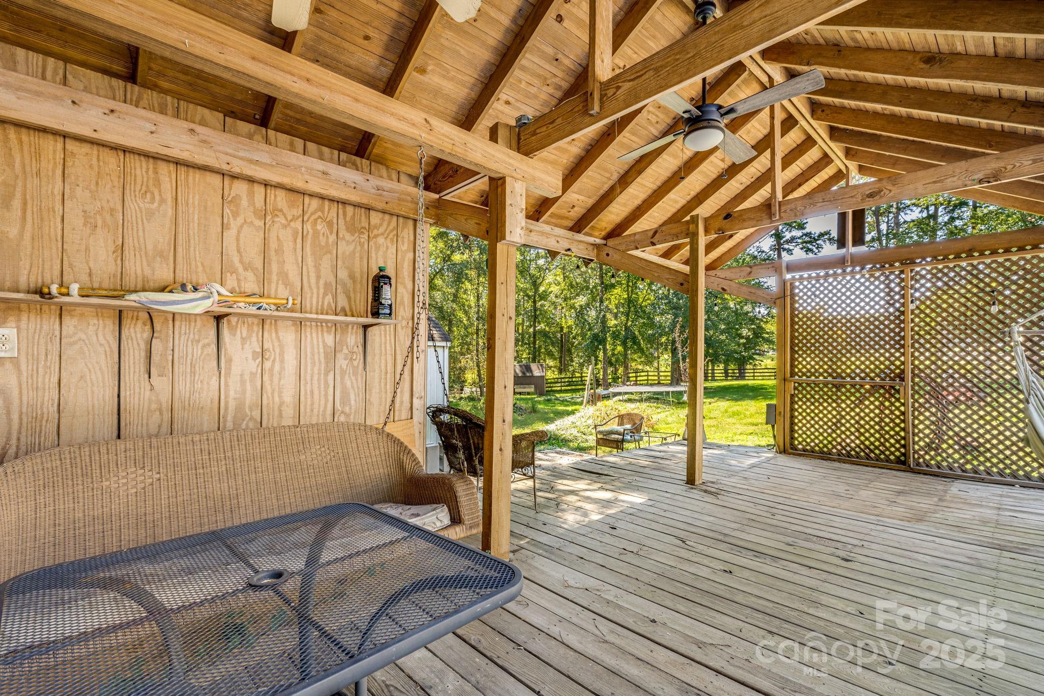 110 Ritchie Drive Shelby, NC 28152 - Photo 42 of 48 a view of an empty room with wooden floor and a window