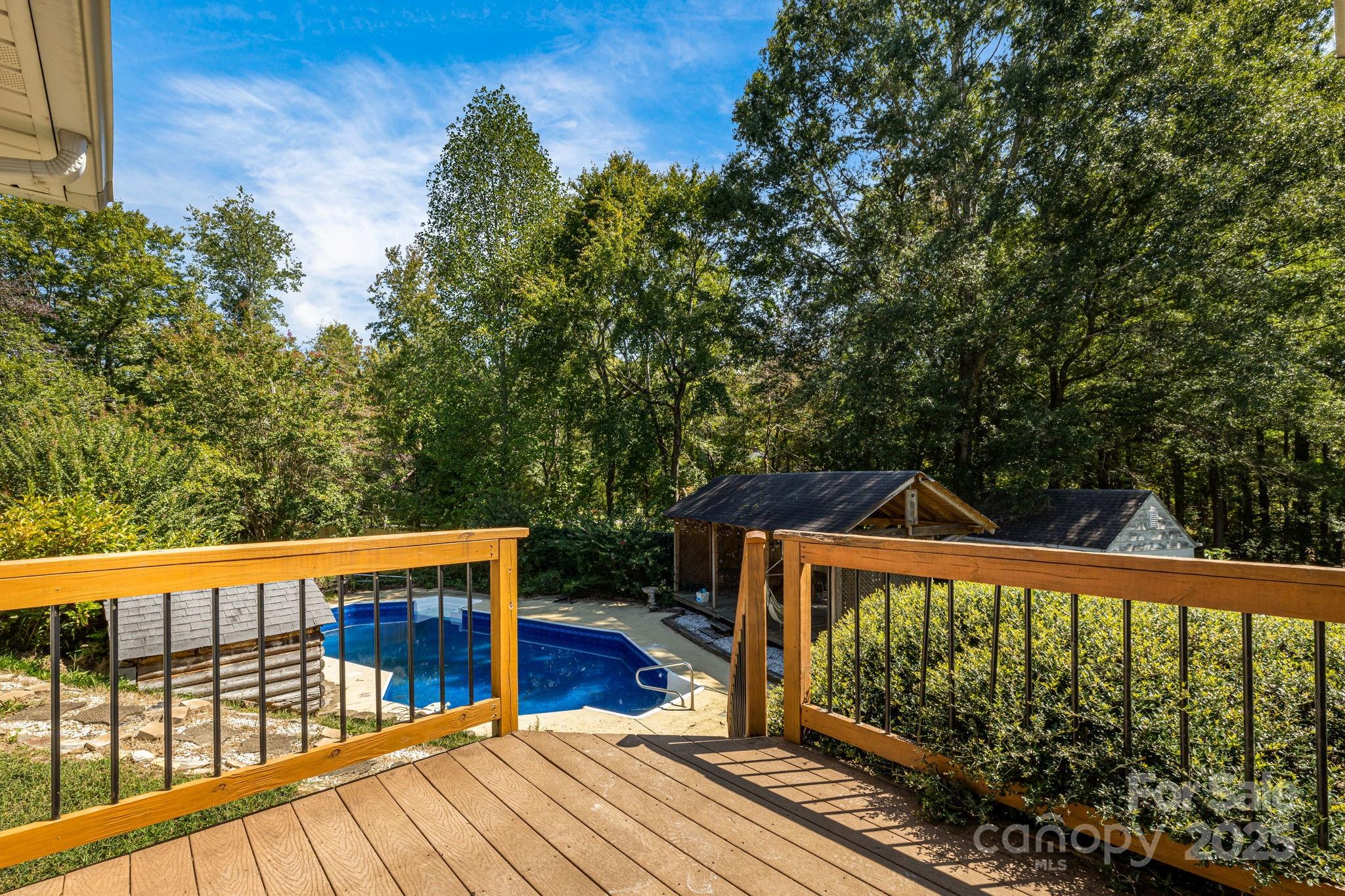 110 Ritchie Drive Shelby, NC 28152 - Photo 45 of 48 a view of a wooden deck and a yard