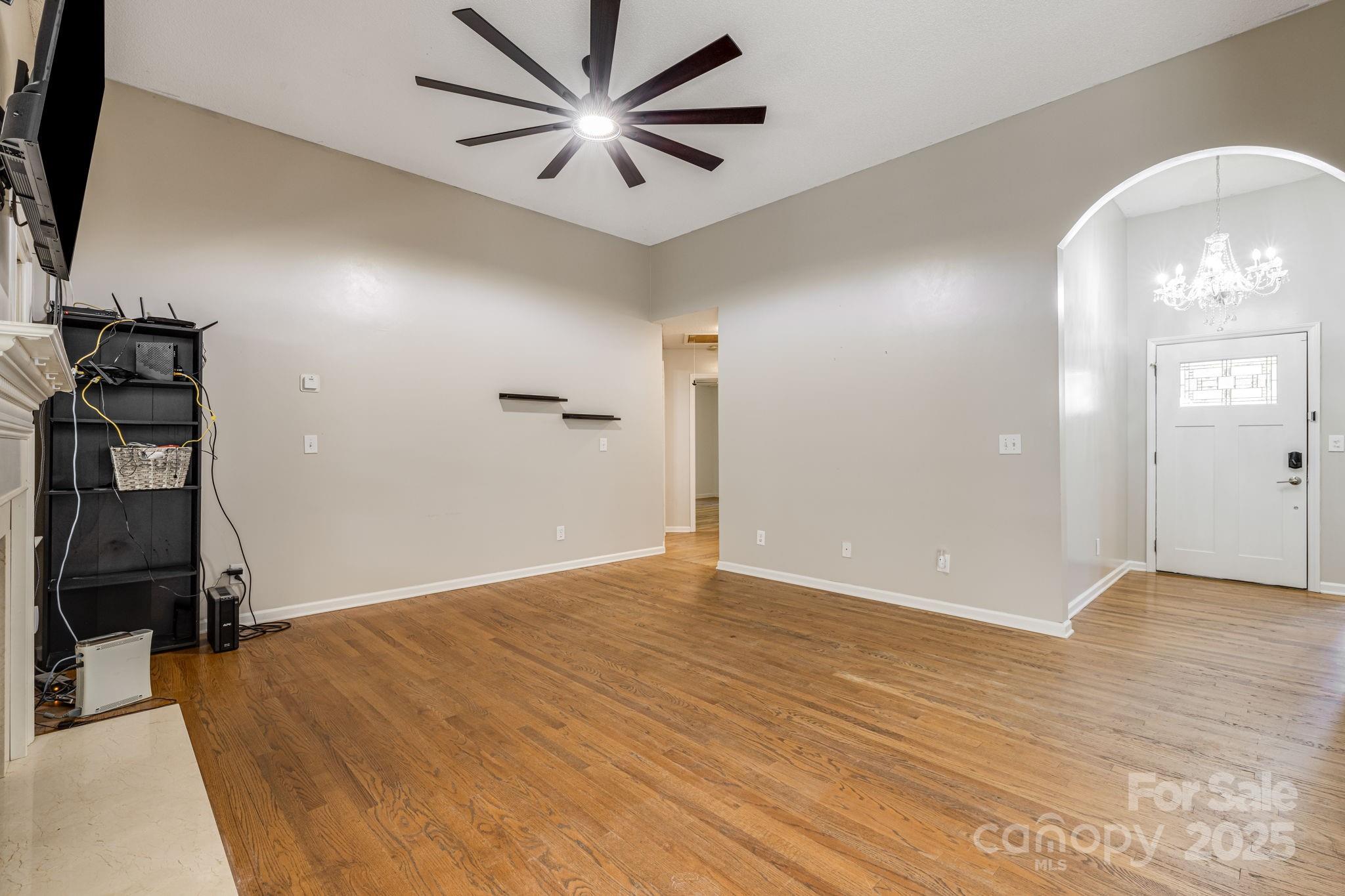 110 Ritchie Drive Shelby, NC 28152 - Photo 5 of 48 wooden floor in an empty room with a window