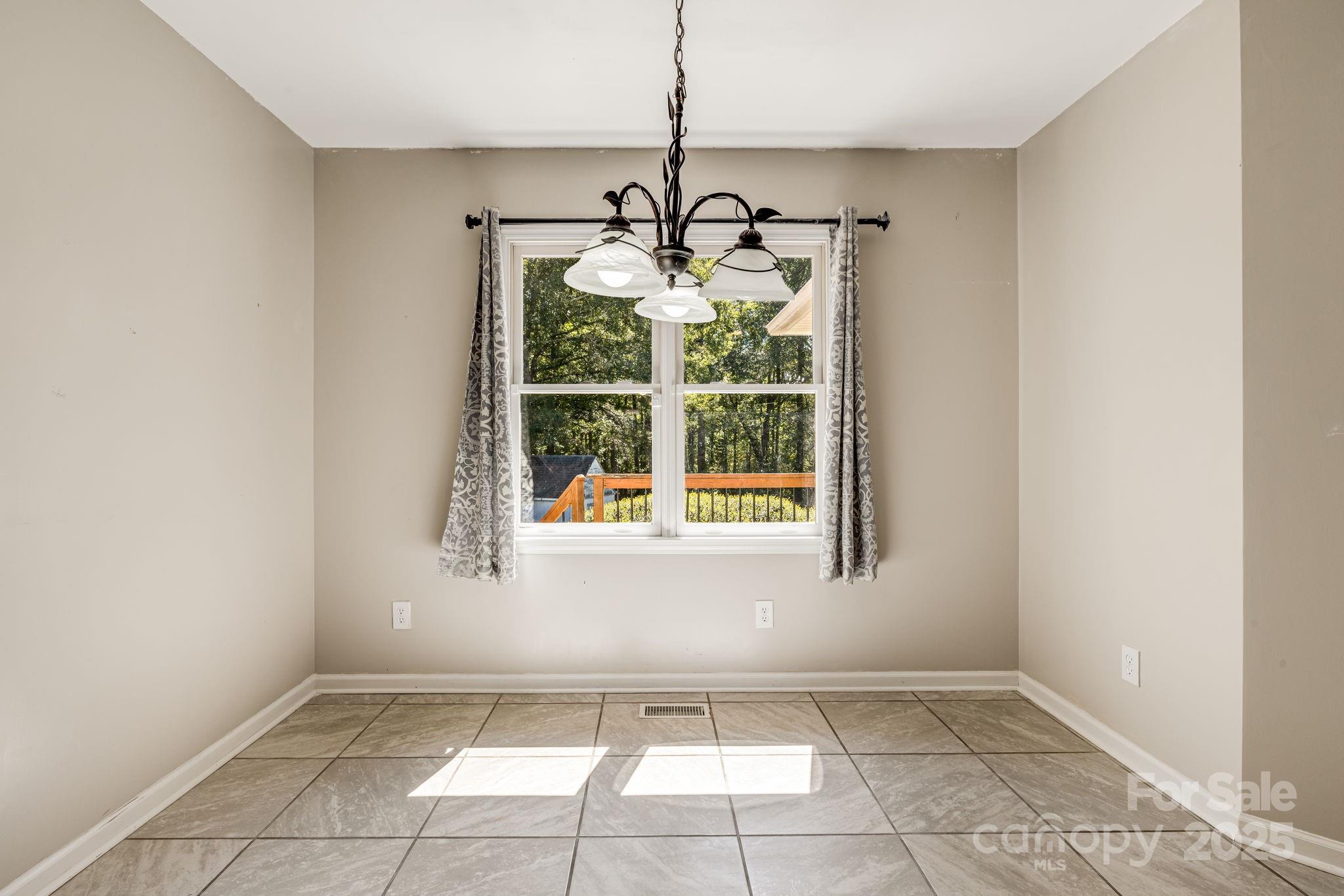110 Ritchie Drive Shelby, NC 28152 - Photo 10 of 48 a view of an empty room and window