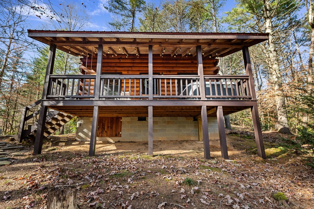 986 Joann Sisson Road Blue Ridge, GA 30513 - Photo 7 of 53 front view of a house with a balcony