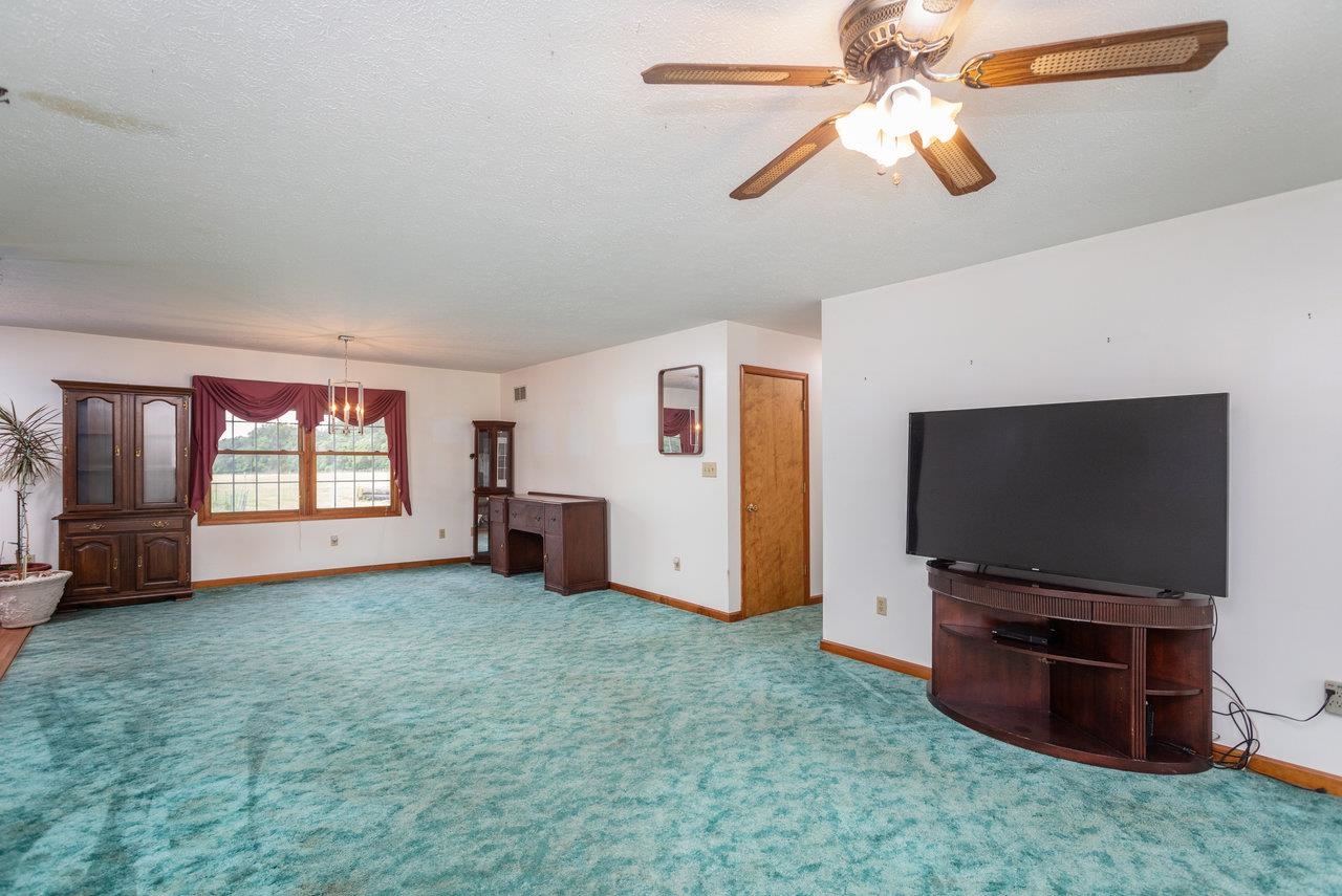 1163 Fleeburg Loop Shenandoah, VA 22849 - Photo 13 of 47 a living room with furniture and a flat screen tv