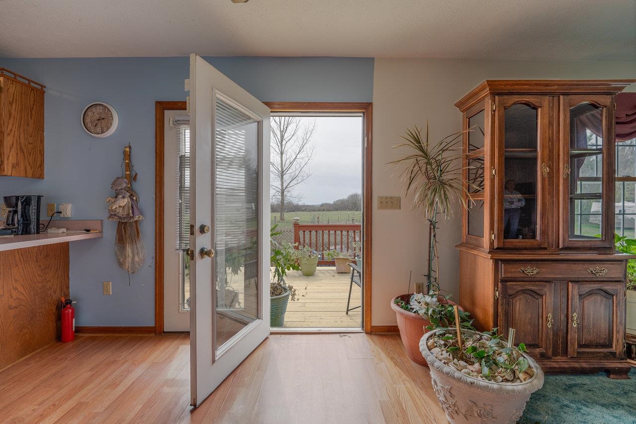 1163 Fleeburg Loop Shenandoah, VA 22849 - Photo 7 of 47 a view of an entryway with wooden floor and a table