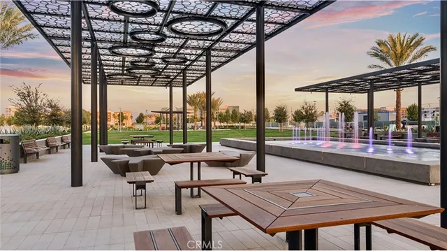 a view of a swimming pool with a lawn chairs