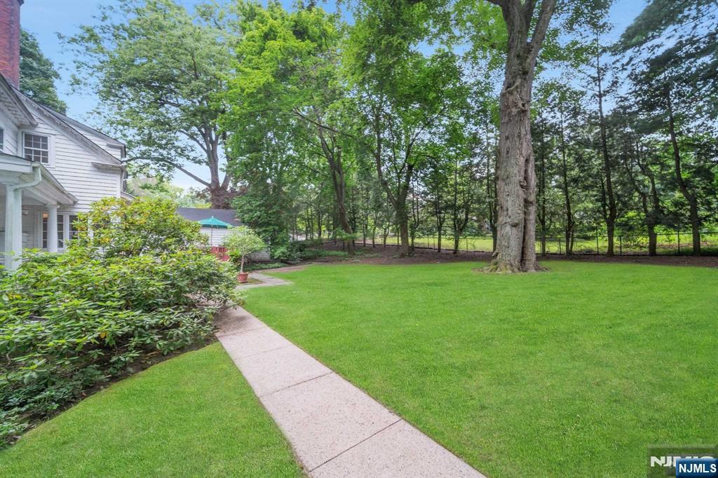 232 County Road Demarest, NJ 07627 - Photo 44 of 48 a view of green field with trees in the background