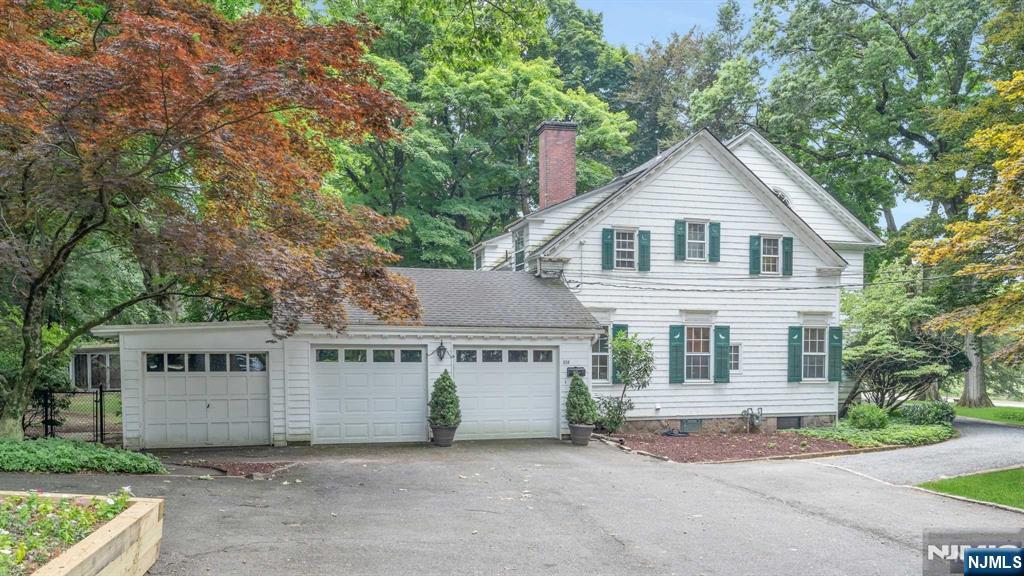 232 County Road Demarest, NJ 07627 - Photo 46 of 48 front view of a house with a yard