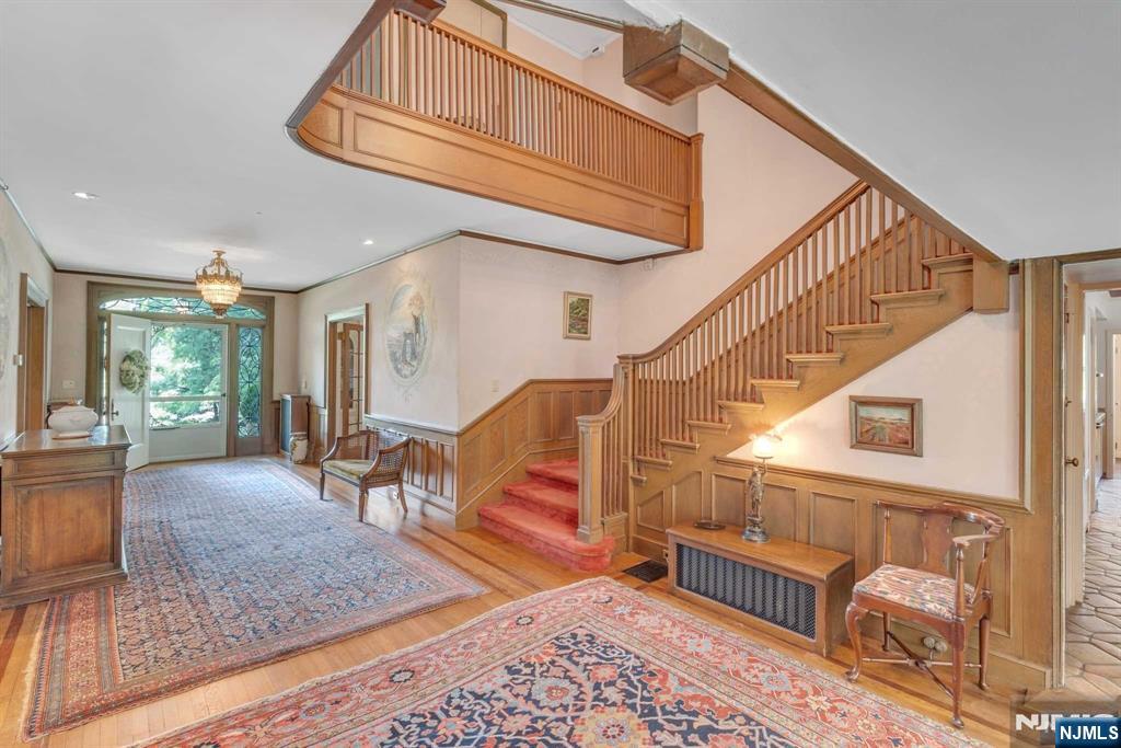 232 County Road Demarest, NJ 07627 - Photo 7 of 48 a view of an entryway with wooden floor and a rug