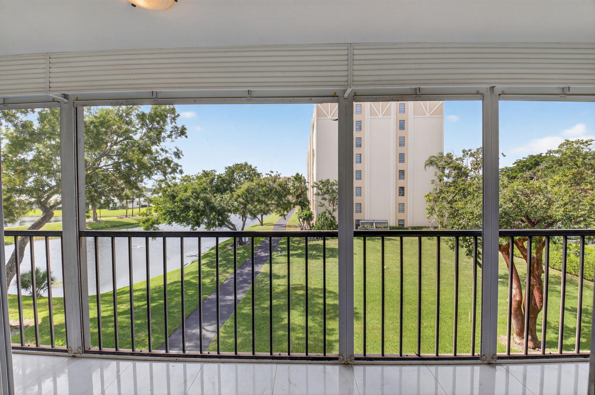 14375 Strathmore Lane, Unit 305 Delray Beach, FL 33446 - Photo 36 of 92 a view of a street view from a balcony