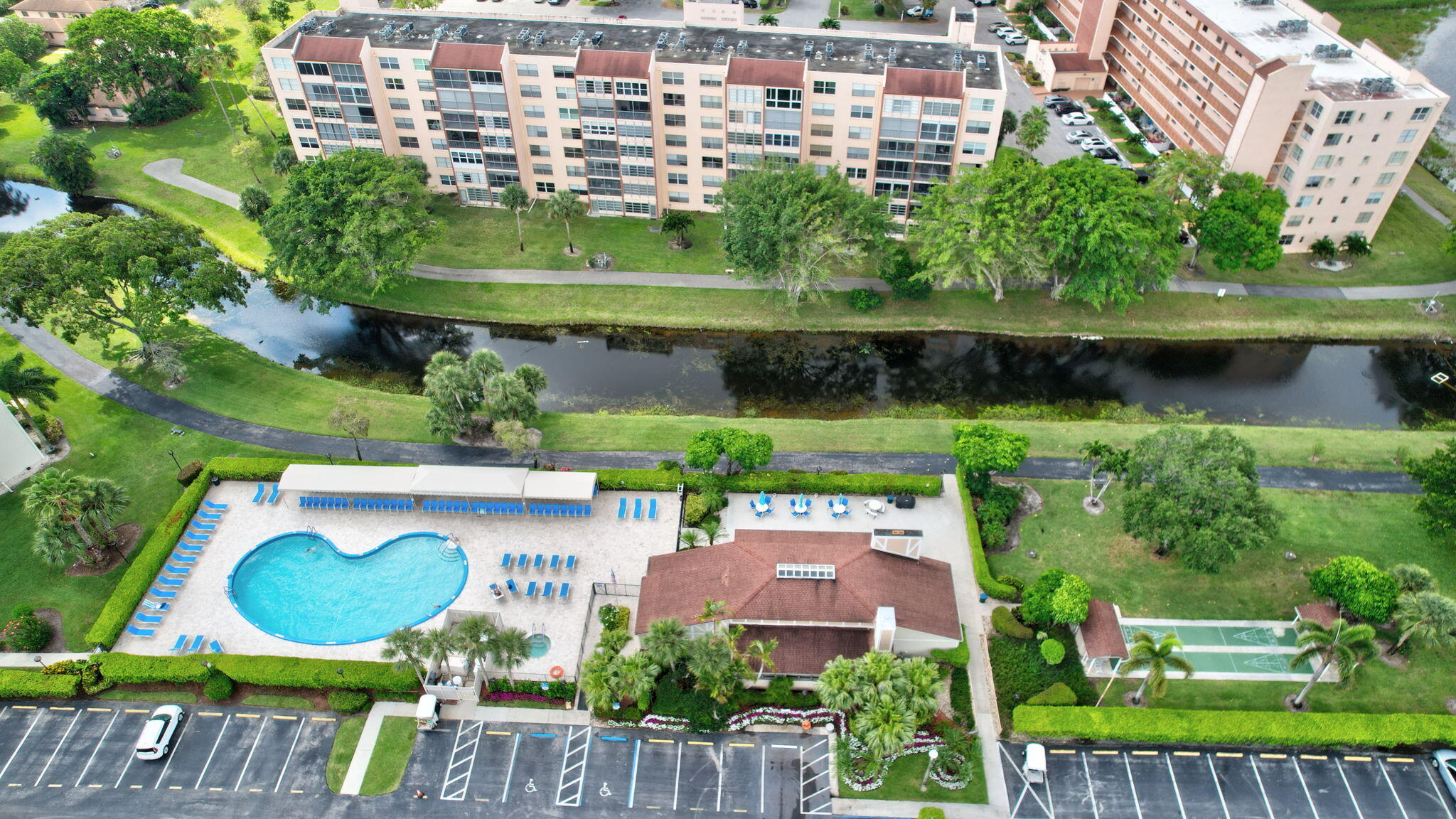 14375 Strathmore Lane, Unit 305 Delray Beach, FL 33446 - Photo 55 of 92 an aerial view of a house with a garden and lake view