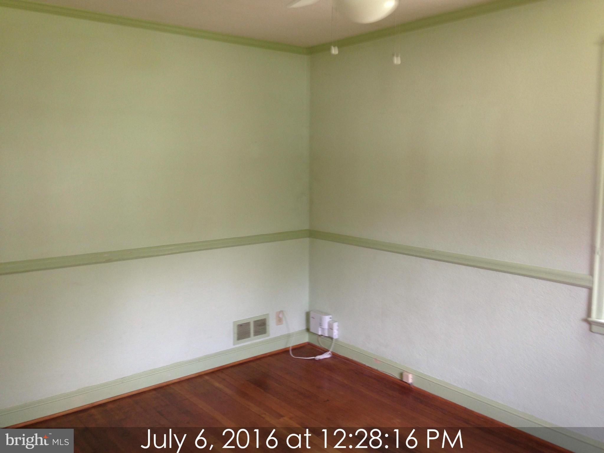 3715 Buckingham Road Baltimore, MD 21207 - Photo 5 of 9 a view of an empty room