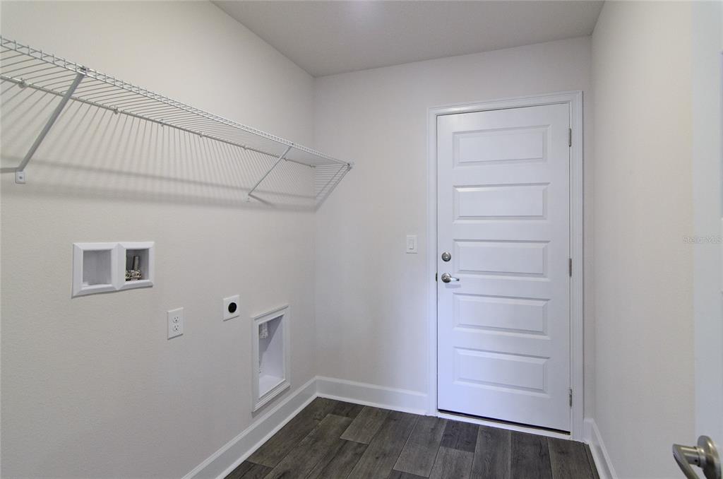 2 Seckel Court Palm Coast, FL 32164 - Photo 25 of 26 a view of walk in closet with empty racks