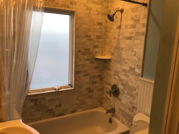 a bathroom with a bathtub
