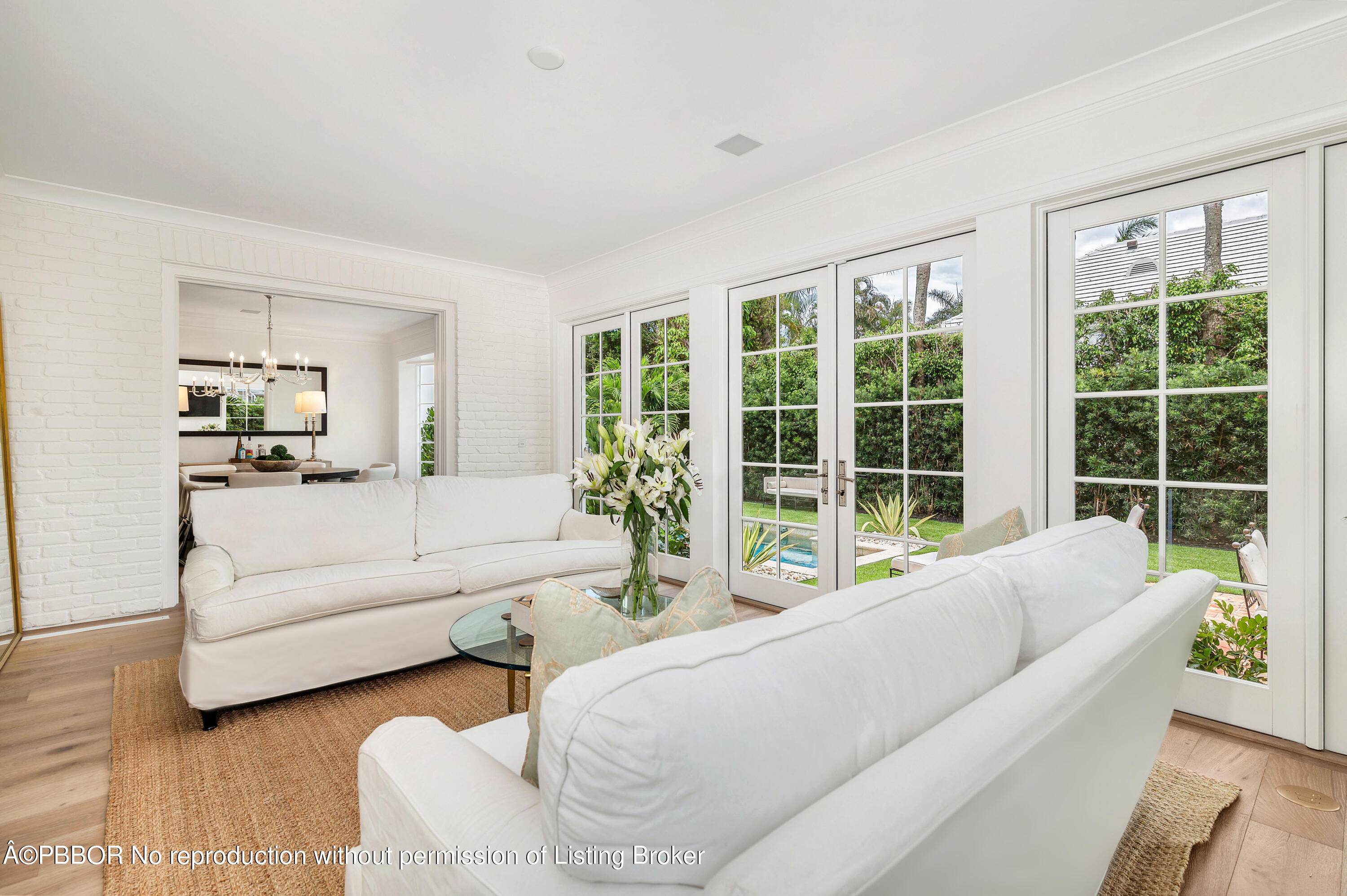 236 Pendleton Avenue Palm Beach, FL 33480 - Photo 16 of 35 a living room with furniture and a large window