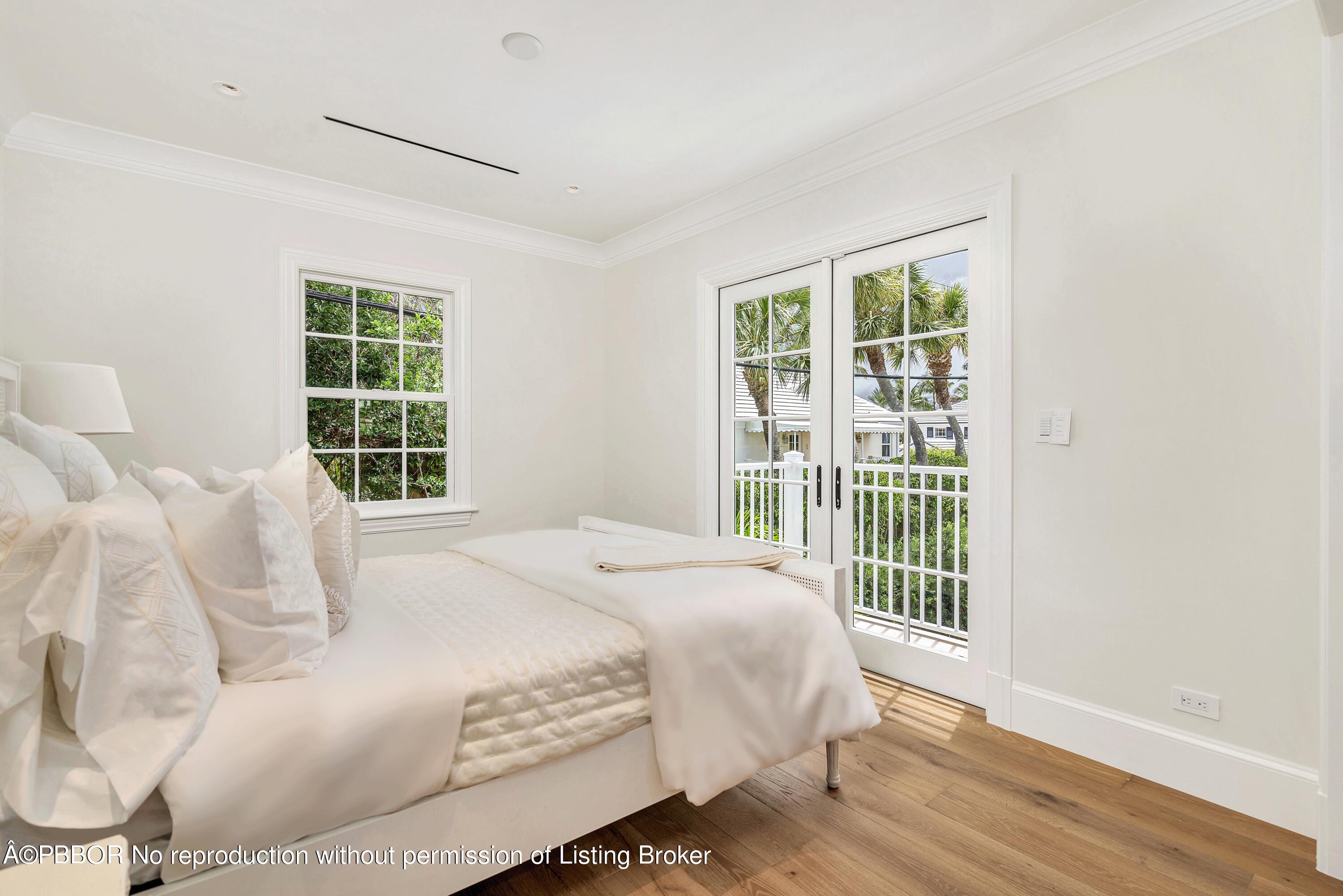 236 Pendleton Avenue Palm Beach, FL 33480 - Photo 28 of 35 a bedroom with a bed and a window