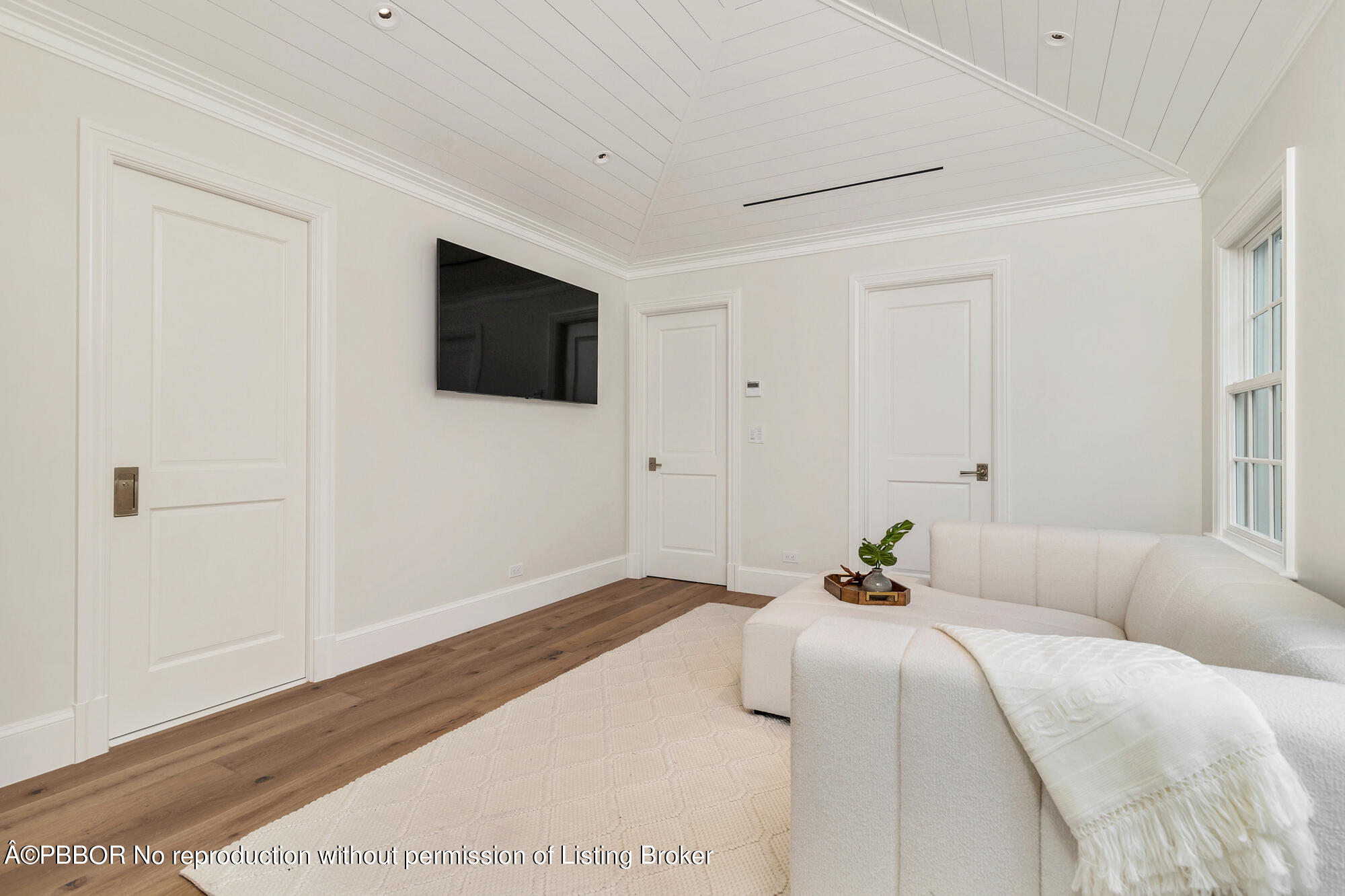 236 Pendleton Avenue Palm Beach, FL 33480 - Photo 29 of 35 a bedroom with a bed and a flat screen tv