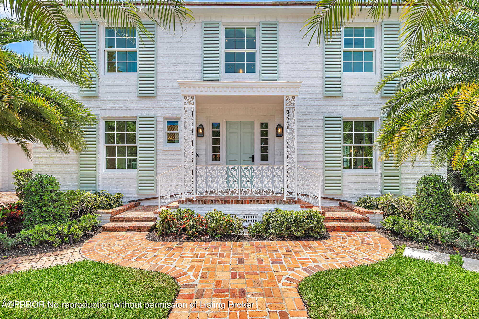 236 Pendleton Avenue Palm Beach, FL 33480 - Photo 3 of 35 a front view of a house with a yard