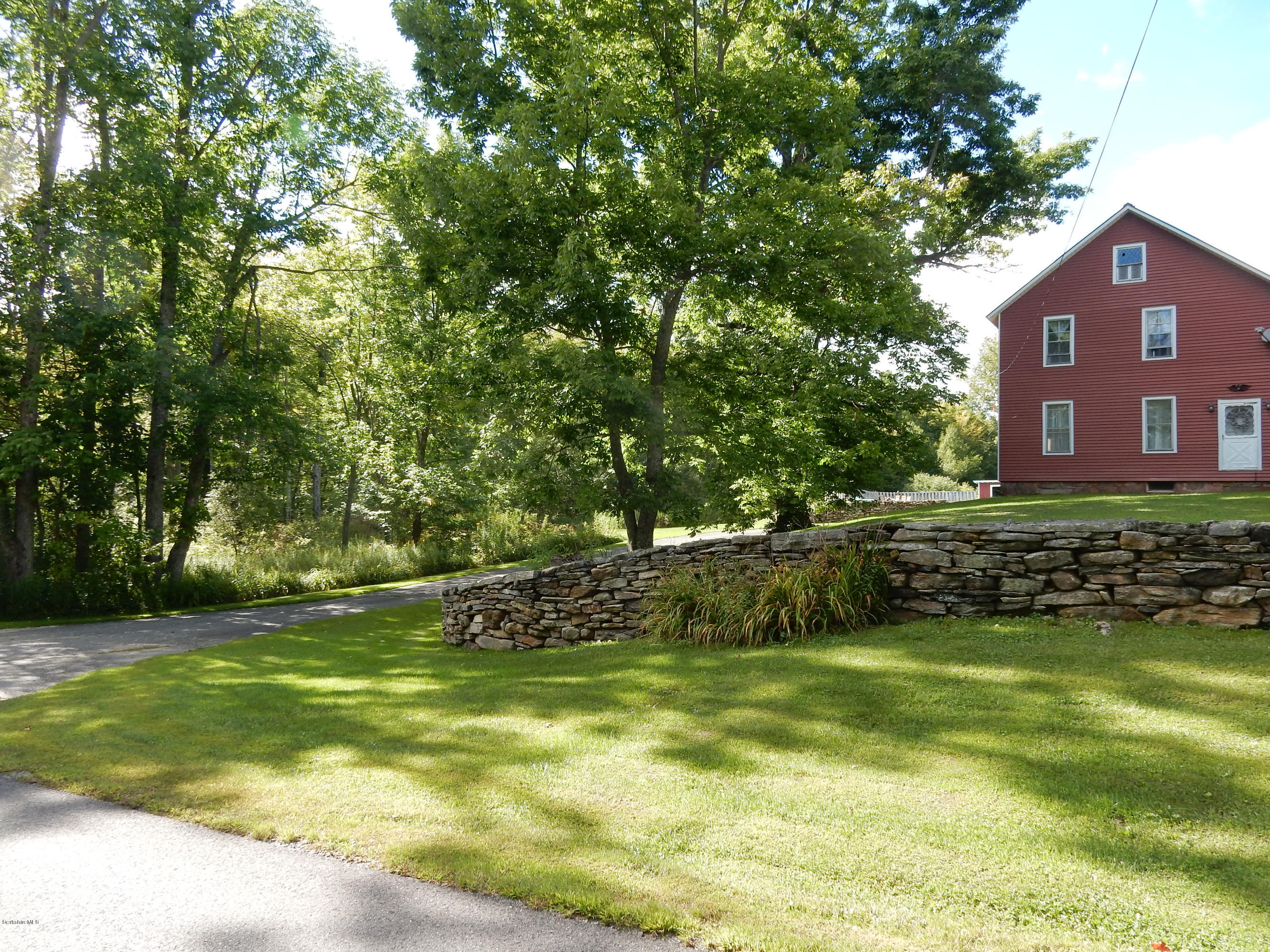 706 Frost Road Washington, MA 01223 - Photo 14 of 84 a backyard of a house with lots of green space