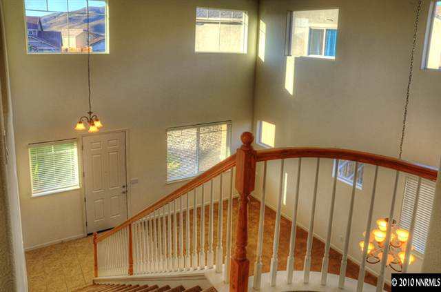 2530 7 Pines Court Reno, NV 89521 - Photo 4 of 9 a view of staircase with railing and a window