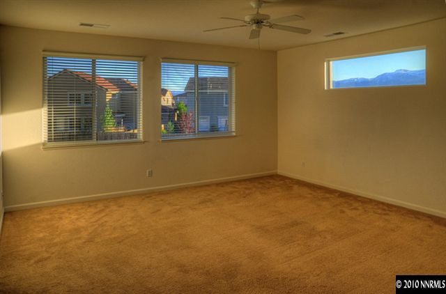 2530 7 Pines Court Reno, NV 89521 - Photo 7 of 9 a view of an empty room with a window