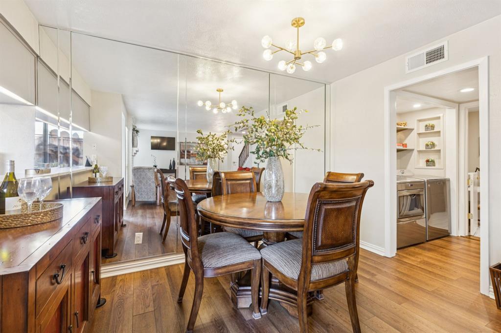 2016 Via Miramonte Carrollton, TX 75006 - Photo 12 of 34 a view of a dining room with furniture and wooden floor