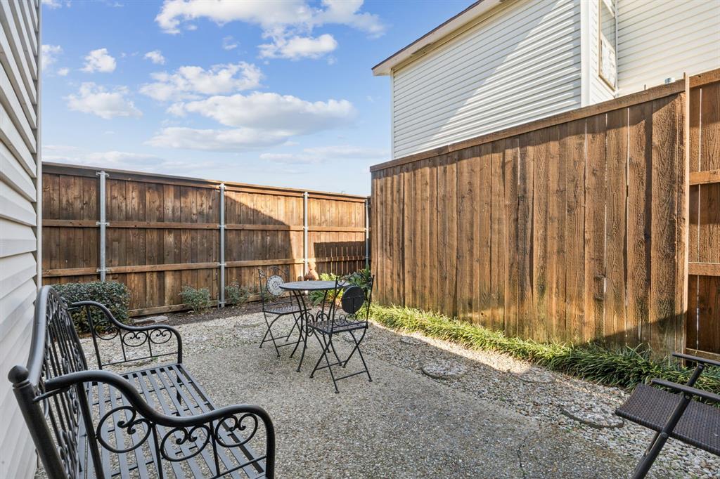 2016 Via Miramonte Carrollton, TX 75006 - Photo 25 of 34 a view of a patio with a table and chairs