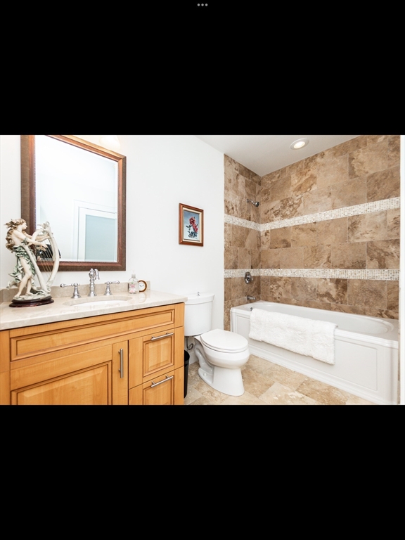 19 Worcester Square, Unit 1 Boston, MA 02118 - Photo 16 of 35 a bathroom with a sink and a bathtub