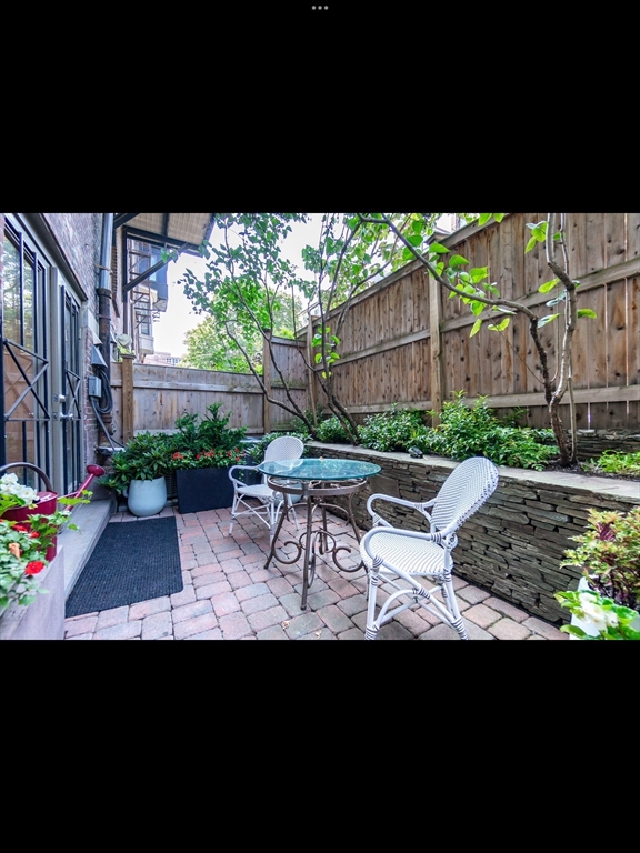 19 Worcester Square, Unit 1 Boston, MA 02118 - Photo 31 of 35 a view of house with backyard outdoor seating and hardwood