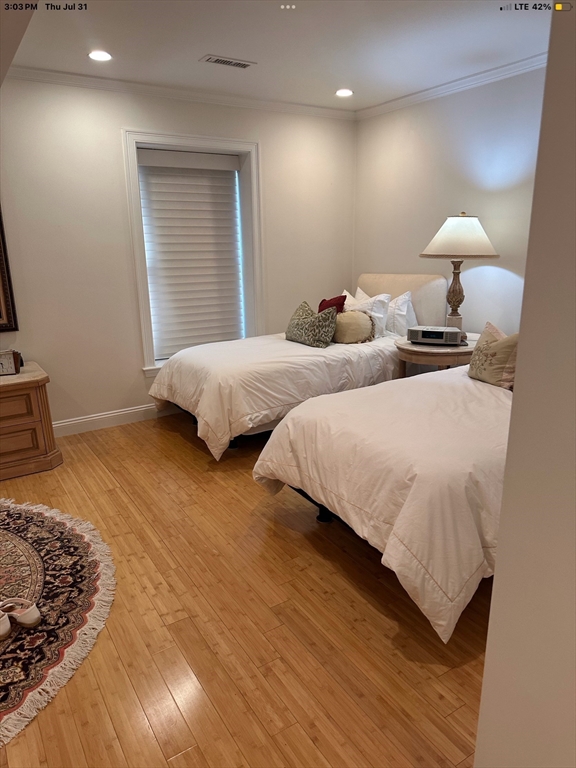 19 Worcester Square, Unit 1 Boston, MA 02118 - Photo 7 of 35 a bedroom with two beds and a night stand