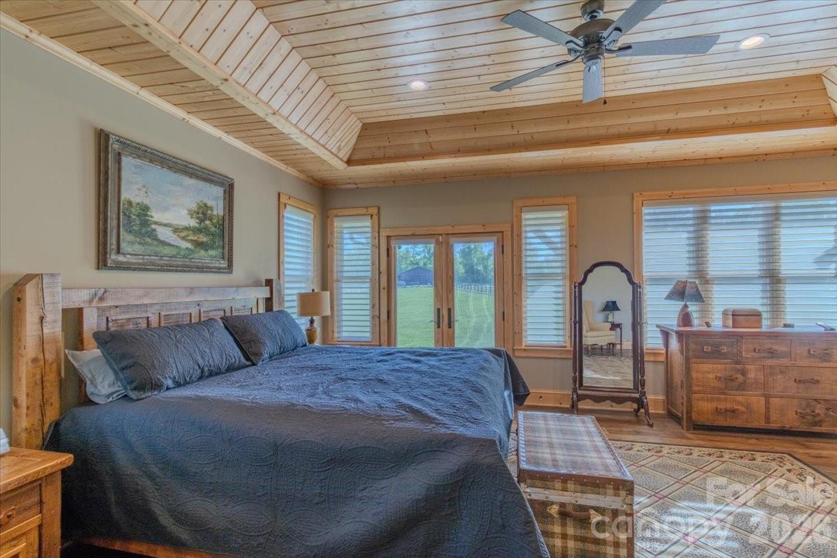 1083 Union Community Road Thurmond, NC 28683 - Photo 15 of 47 a bedroom with a bed and a dresser