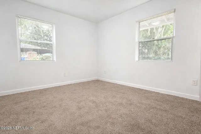 an empty room with a window