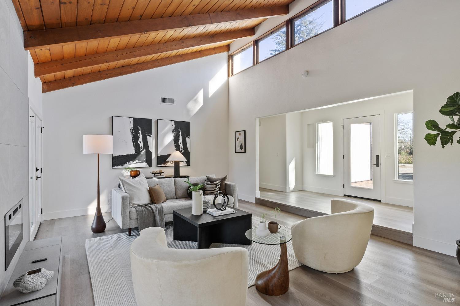 1282 Fowler Creek Road Sonoma, CA 95476 - Photo 33 of 86 a living room with furniture and wooden floor