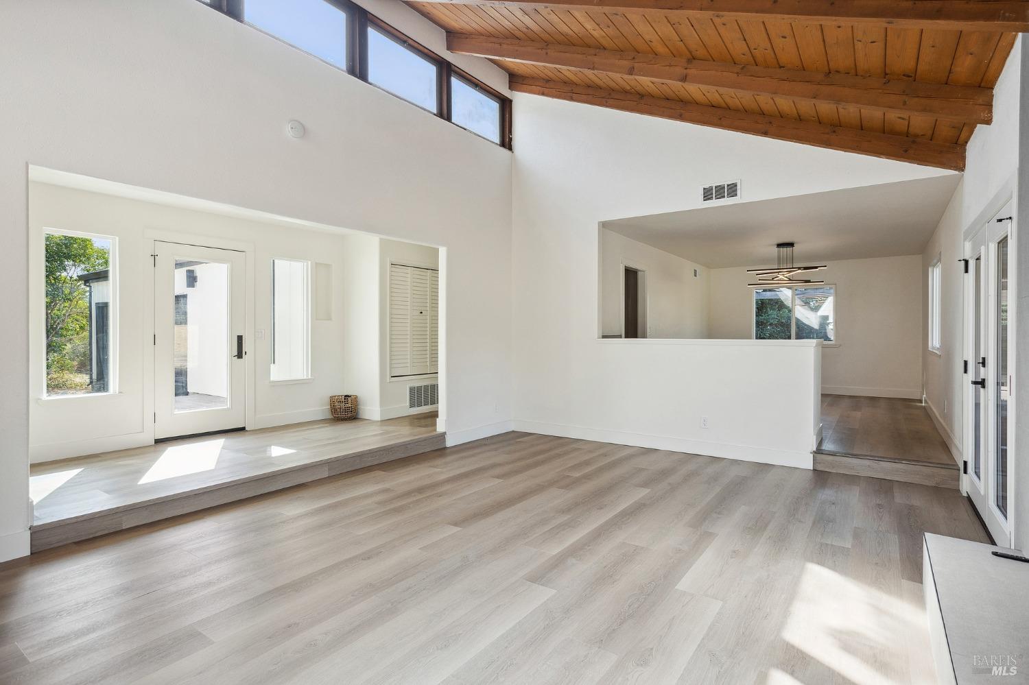 1282 Fowler Creek Road Sonoma, CA 95476 - Photo 35 of 86 a view of a big room with wooden floor and windows